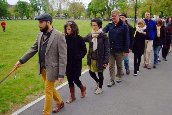 Carmen P leads walk May Com Ex